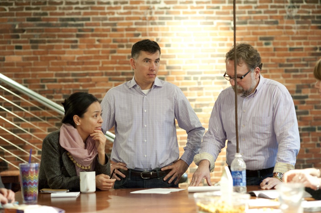 Catherine York, left and John Powers, center, founded The Gilded Nut Snack Co. in 2013. Photo courtesy of Cyndi Smith